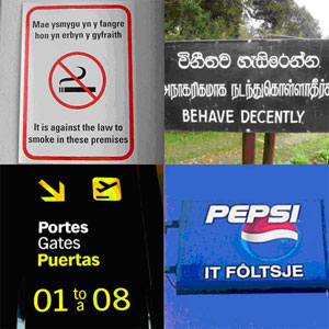 Kartelak hainbat hizkuntzatan.