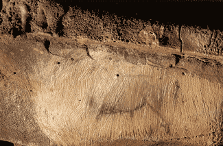 Figura grabada y pintada